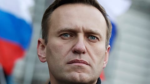 Russian opposition activist Alexei Navalny takes part in a march in memory of opposition leader Boris Nemtsov in Moscow, Russia, on Saturday, Feb. 29, 2020.