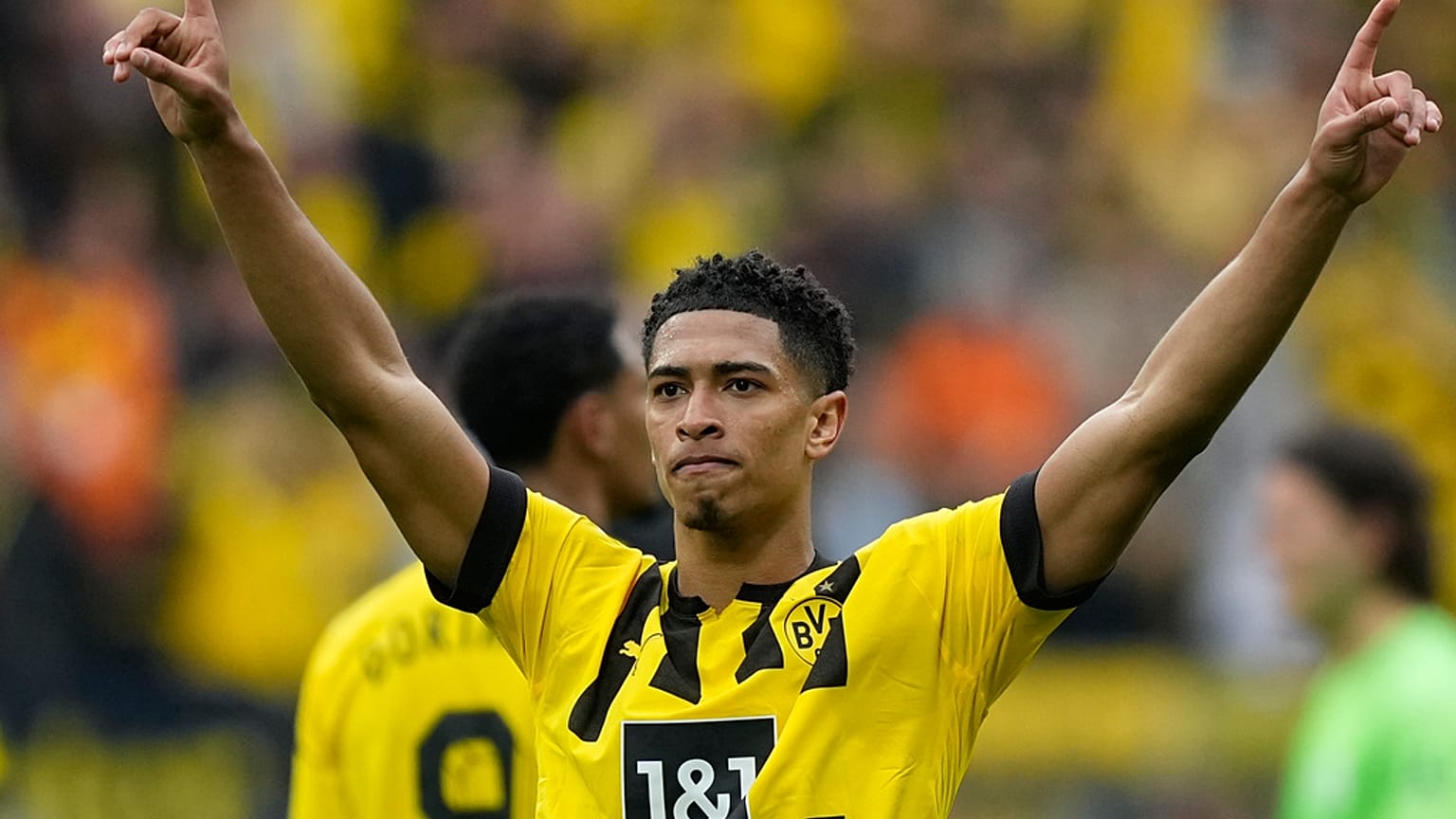 Dortmund's Jude Bellingham celebrates scoring his side's fourth goal during the German Bundesliga match between Borussia Dortmund and VfL Wolfsburg Saturday, May 7, 2023