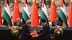 وزير الخارجية الفلسطيني رياض المالكي ونظيره الصيني تشين غانغ