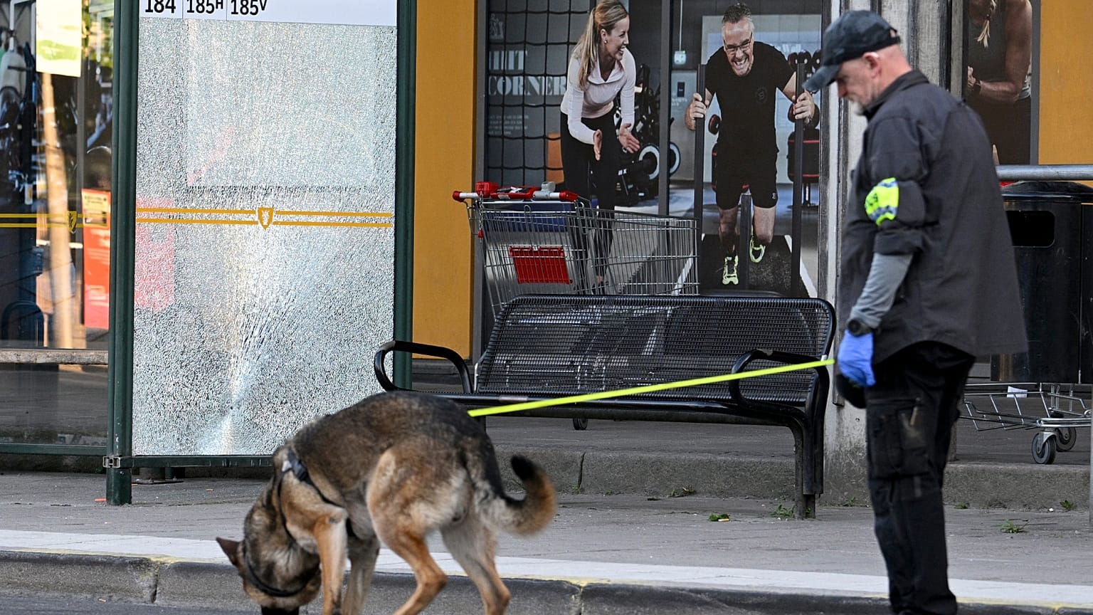 Police at the scene after a shooting incident, in Farsta, southern Stockholm, Saturday, June 10, 2023.