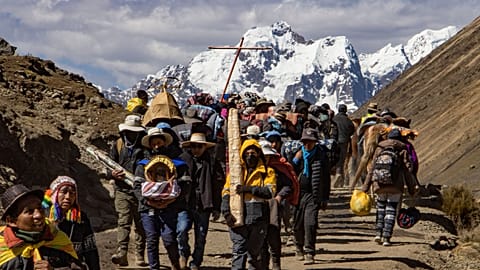 Devotees climb up the skirts of the Sinakara Mount to reach the shrine of the Lord of Qoyllur Rit'i 