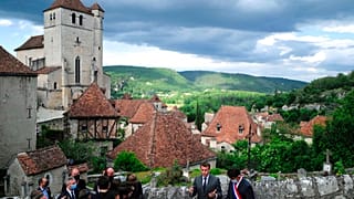 Der französische Präsident Emmanuel Macron in der Region Lot, um für das touristische Erbe Frankreichs zu werben