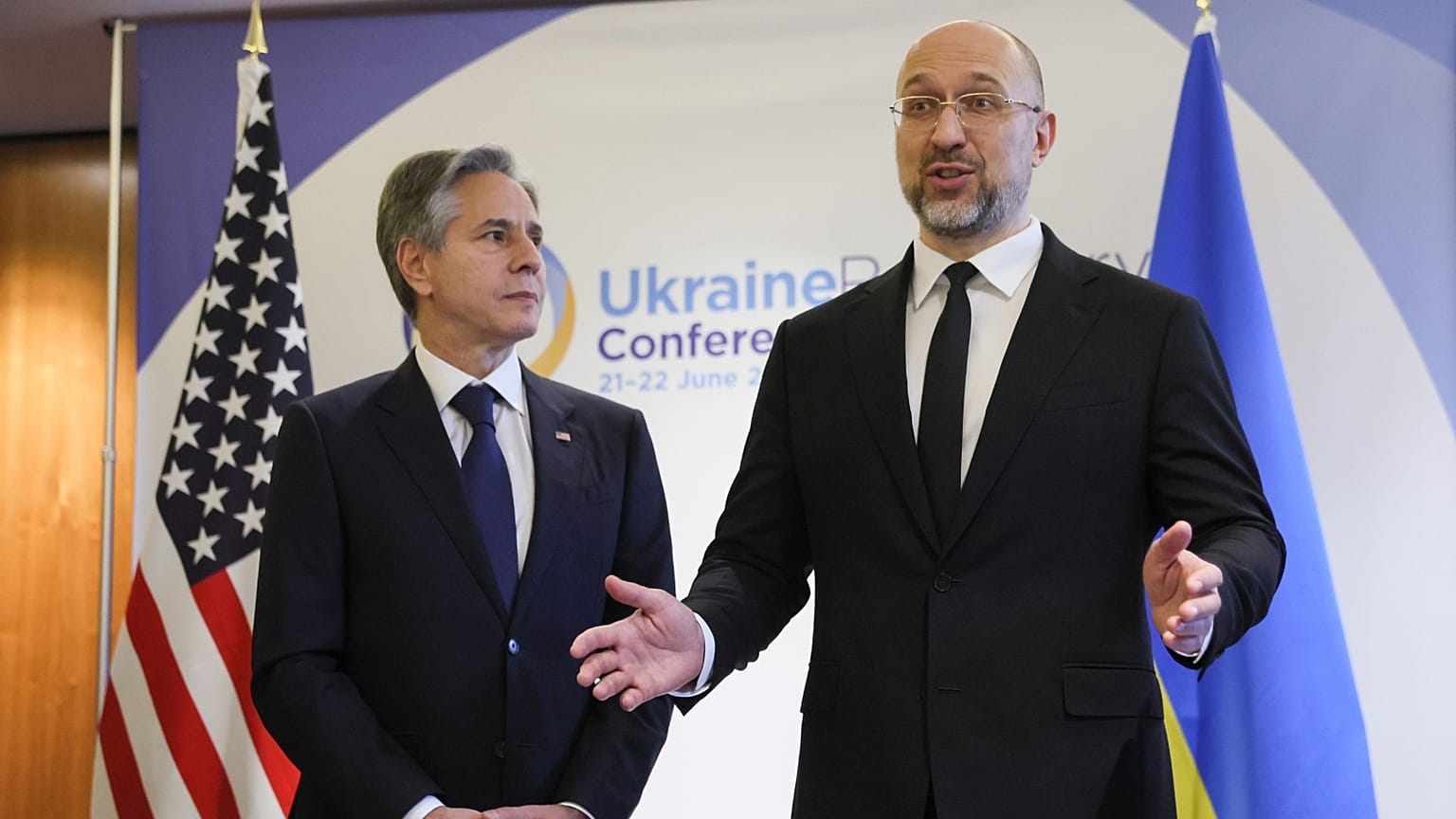 U.S. Secretary of State Antony Blinken, left, meets Ukrainian Prime Minister Denys Shmyhal during the Ukraine Recovery Conference in London, Wednesday, June 21, 2023.