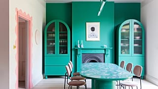 A riot of colour and contrasts - the dining room at Jordan Cluroe and Russell Whitehead's London home 