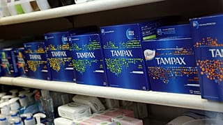 Women's sanitary products on sale at a small pharmacy in London.. 