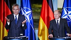 German Chancellor Olaf Scholz, right, and NATO Secretary General Jens Stoltenberg