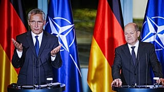 German Chancellor Olaf Scholz, right, and NATO Secretary General Jens Stoltenberg