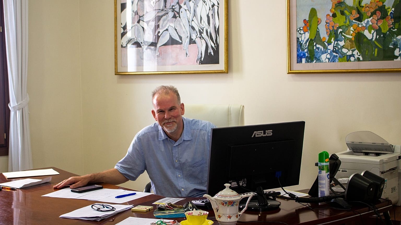 Richard Thompson with his teapot in his office in Sant Joan Town Hall.