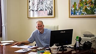 Richard Thompson with his teapot in his office in Sant Joan Town Hall.