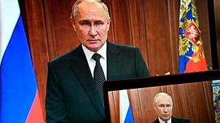 Vladimir Putin records an address from his office as Wagner troops advance toward Moscow