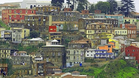 Houses are seen on Toro Hill in the Chilean port city of Valparaiso, Wednesday July 2, 2003.