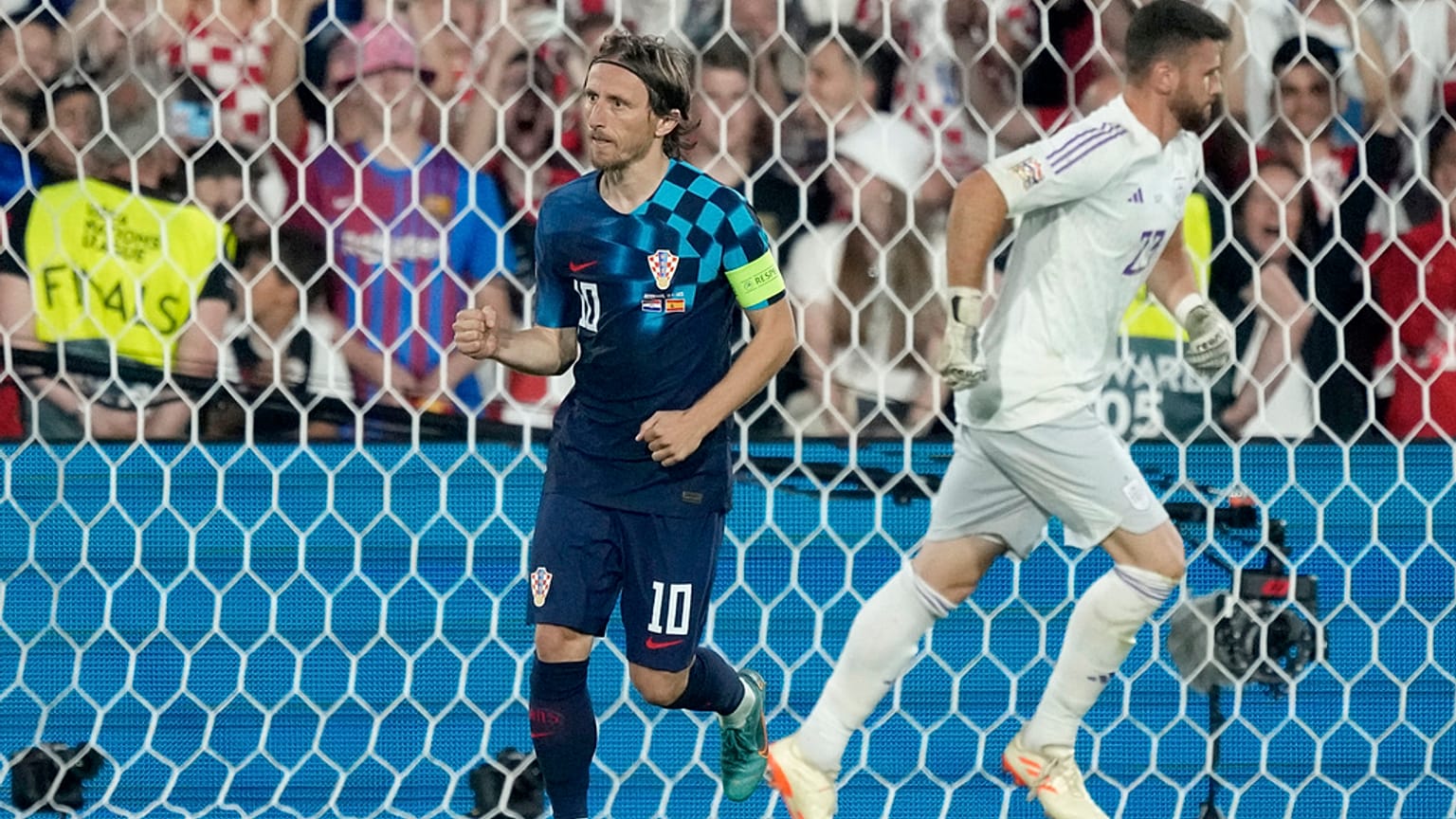 Croatia's Luka Modric reacts after scoring during a penalty shootout at the end of the Nations League final soccer match between Croatia and Spain in Rotterdam.