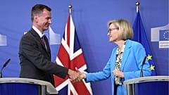 British Chancellor of the Exchequer Jeremy Hunt, left, and European Commissionner for Financial services Mairead McGuinness at EU headquarters in Brussels, 27 June 2023.