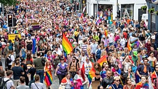 People take part in the Pride Edinburgh 2023 parade through Edinburgh city center, Scotland, Saturday June 24, 2023.
