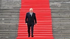 Russian President Vladimir Putin walks down the steps to address troops from the defence ministry on the grounds of the Kremlin in central Moscow on June 27, 2023.