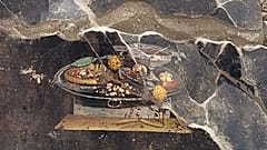 Das Wandgemälde in Pompeji zeigt laut Experten eine Art Vorgänger der heutigen Pizza