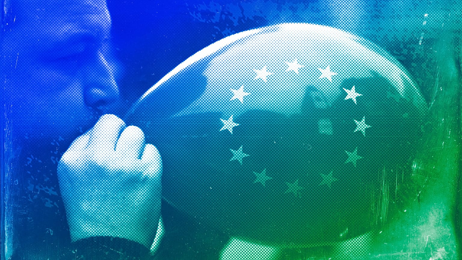 A man inflates a balloon with the European flag during a gathering to celebrate the 60th anniversary of the EU in Madrid, March 2017
