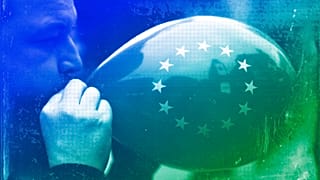 A man inflates a balloon with the European flag during a gathering to celebrate the 60th anniversary of the EU in Madrid, March 2017