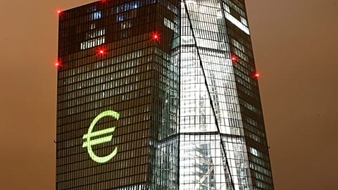 The Euro logo is projected onto the headquarters of the European Central Bank during a dress rehearsal for the "Luminale" light show in Frankfurt, Germany.