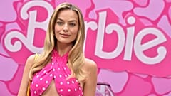 Barbie girl - Margot Robbie poses in pink at a photocall for the upcoming movie