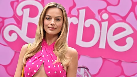 Barbie girl - Margot Robbie poses in pink at a photocall for the upcoming movie