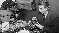 John Logie Baird, the inventor of television - originally known as wireless vision - at work adjusting a transmitter, 1925
