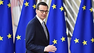 Polish Prime Minister Mateusz Morawiecki harshly criticised the new EU deal to manage the reception and relocation of asylum seekers.