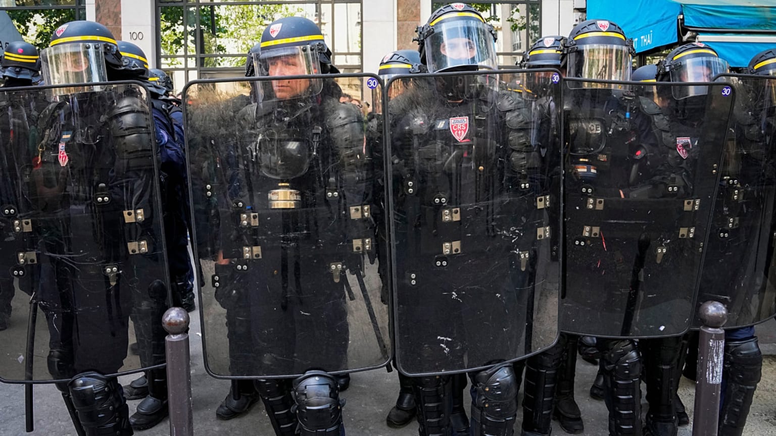 Riot police officers take position during a protest in Paris, France, Tuesday, June 6, 2023. 