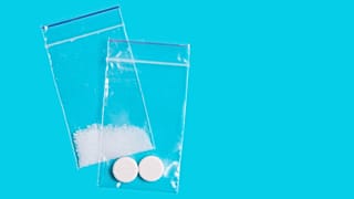 Baggies of pills and powder