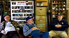 Old people spend time in the garage.