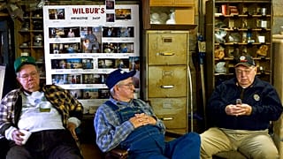 Old people spend time in the garage.