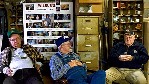 Old people spend time in the garage.