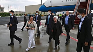 Treasury Secretary Janet Yellen, center, arrives at Beijing