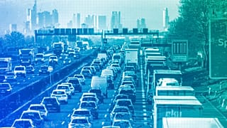 Cars and trucks queue in a traffic jam on a highway near Frankfurt, March 2023