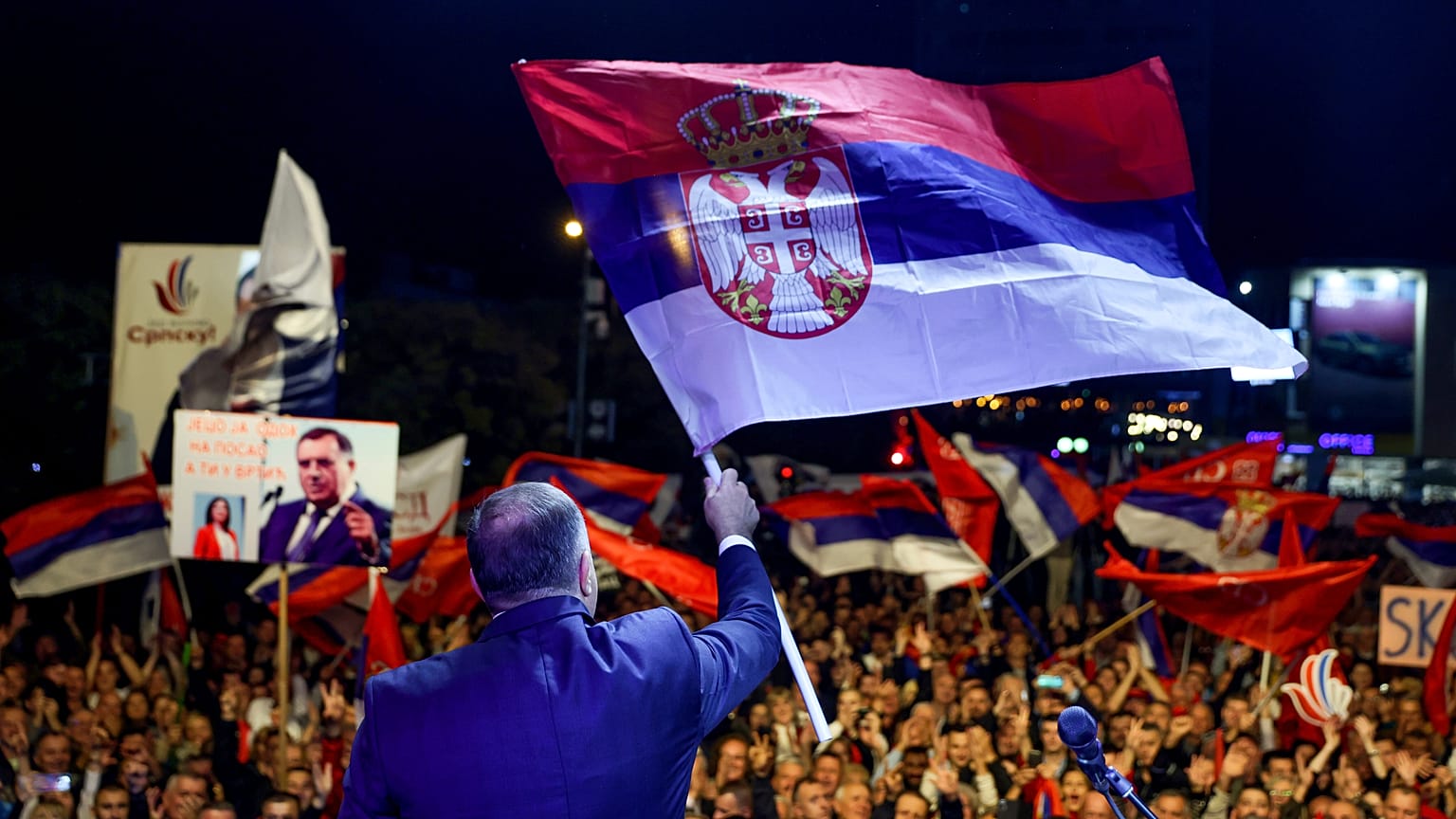 Bosnian Serb leader Milorad Dodik waves a Serbian flag at a protest in Banja Luka, the de facto capital of Republika Srpska.
