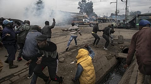 Tear gas fired on opposition convoy as Kenyans stage protests