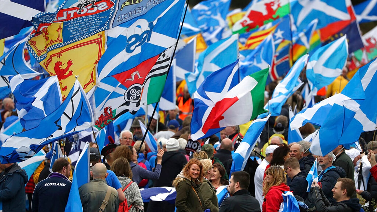 Scottish independence supporters march through Edinburgh, Scotland, Saturday Oct. 5, 2019. 