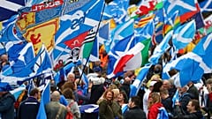 Scottish independence supporters march through Edinburgh, Scotland, Saturday Oct. 5, 2019. 