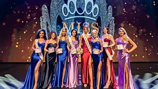 Rikkie Valerie Kollé poses with her co-competitors after being crowned Miss Netherlands
