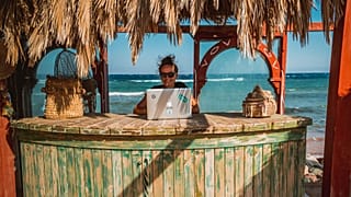 A digital nomad enjoys remote working from Dahab, Egypt