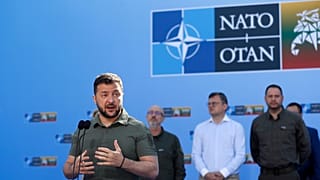 Ukraine's President Volodymyr Zelenskyy speaks with the media as he arrives at the NATO summit in Vilnius, Lithuania.