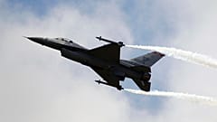 A Lockheed Martin F-16 Jet fighter performs its demonstration flight at the 49th Paris Air Show at Le Bourget airport, east of Paris.