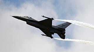 A Lockheed Martin F-16 Jet fighter performs its demonstration flight at the 49th Paris Air Show at Le Bourget airport, east of Paris.