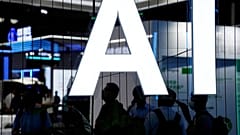 An AI sign at the World Artificial Intelligence Conference (WAIC) attended by Google in Shanghai, China July 6, 2023.