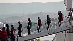 Высадка мигрантов в Калабрии.