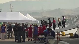 Partra szálló migránsok Reggio Calabriában