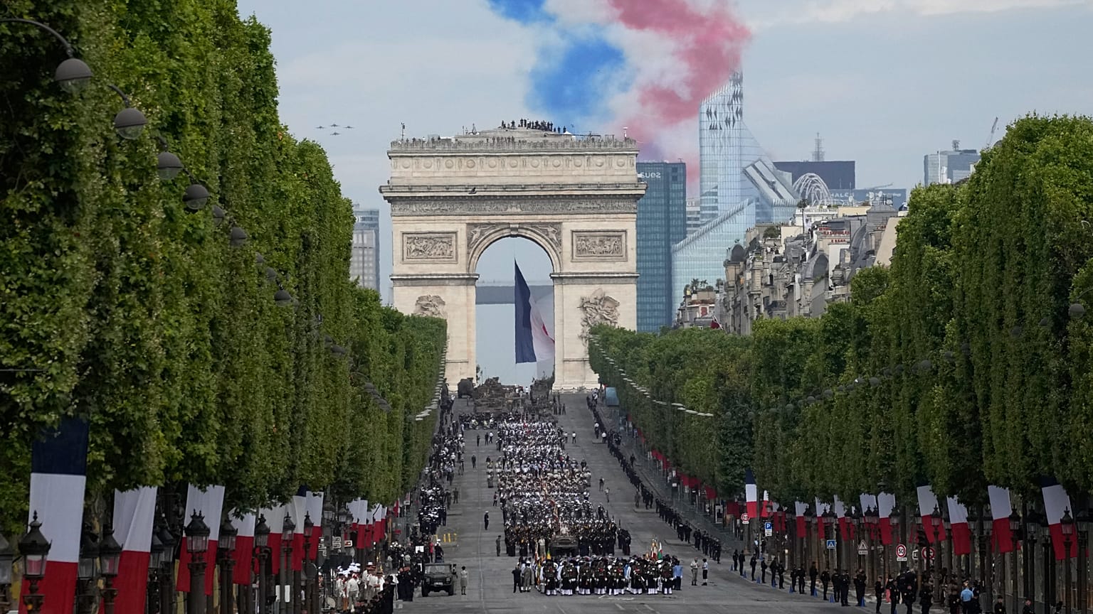 Alphajets of the Patrouille de France fly over the Champs-Elysees avenue during the Bastille Day parade.