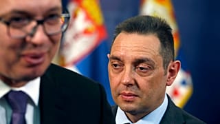 Defense Minister Aleksandar Vulin, right, walks behind President Aleksandar Vucic in Belgrade, Serbia. 23 April 23 2018