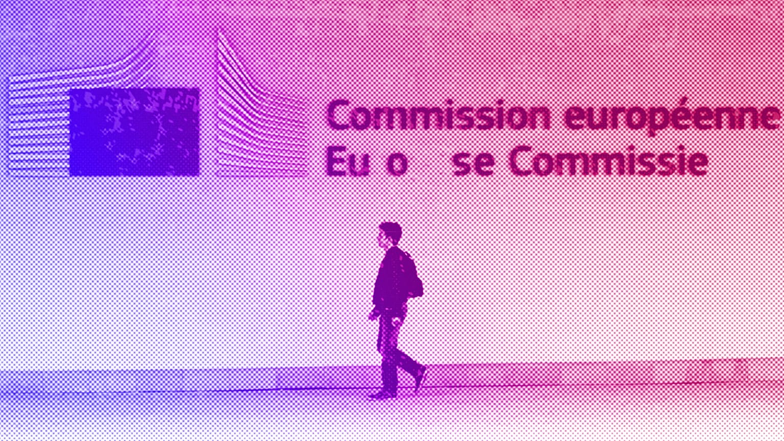 A man walks outside the European Commission headquarters in Brussels, July 2013
