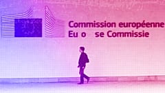 A man walks outside the European Commission headquarters in Brussels, July 2013